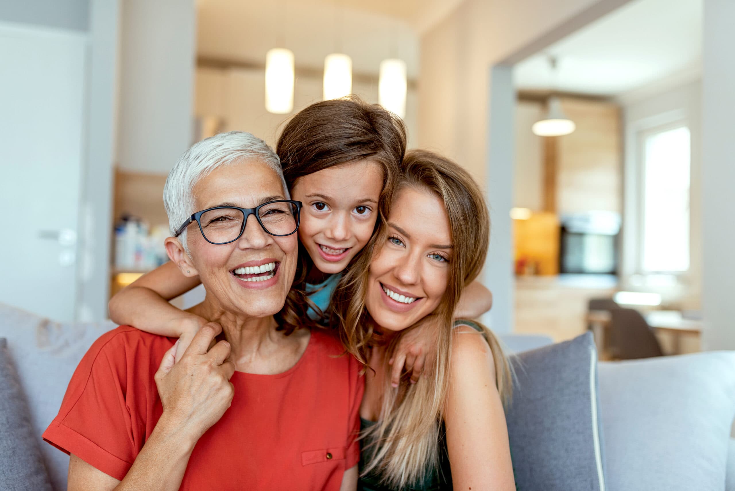 A mother, daughter and granddaughter.