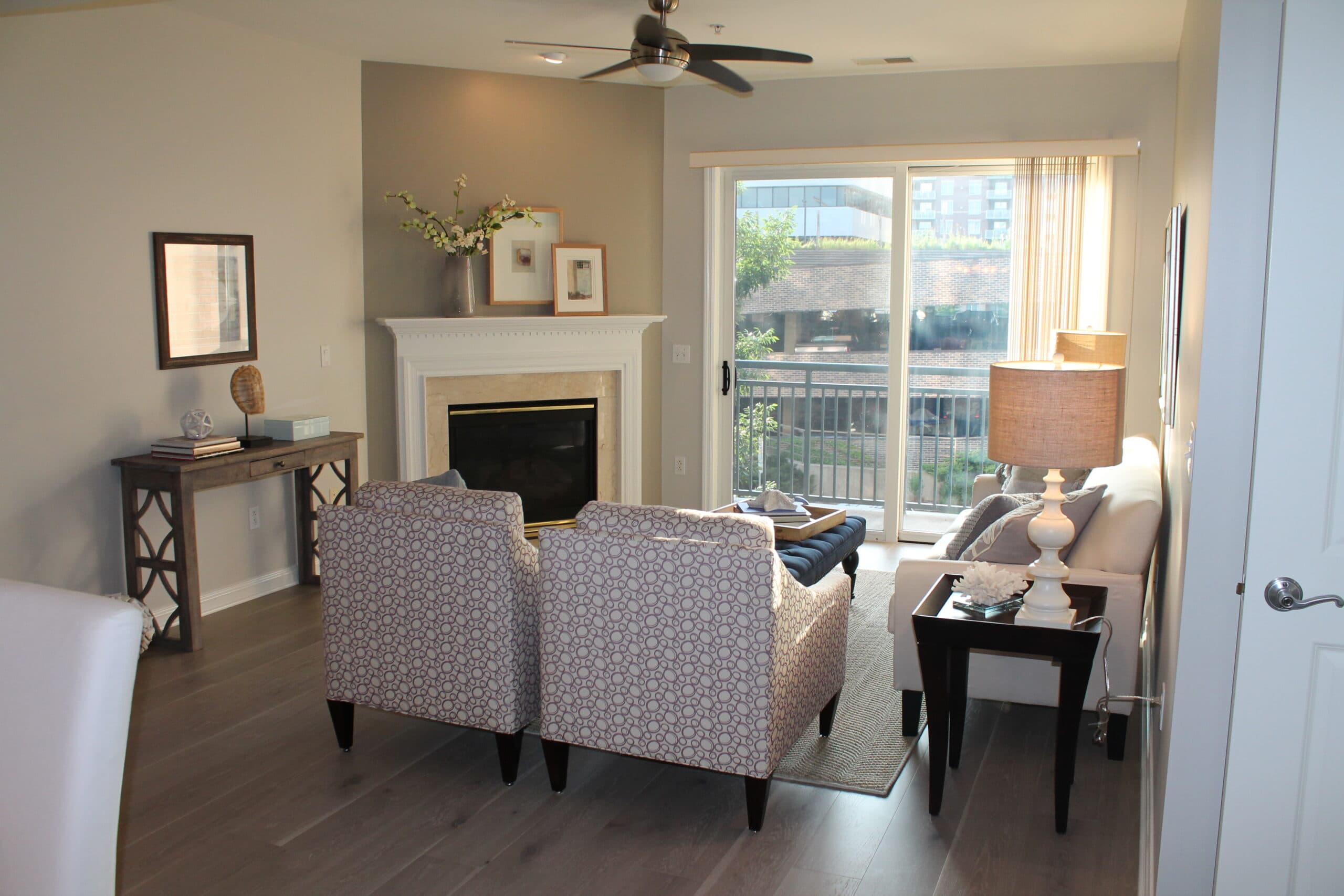 A living room and dining room in the Reno floor plan.